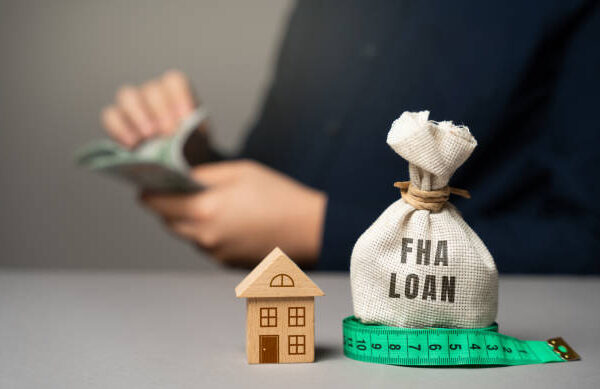 FHA loan concept. Mortgage insured by Federal Housing Administration Loan. Affordable loans for borrowers with a low credit score. Down payment. Purchase or refinance a primary residence.